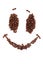 Happy face made of many coffee beans over white background