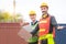 Happy factory worker man team in hard hat smiling and looking at camera with joy, Happiness and funny concept