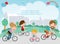 Happy family on bicycles. Healthy cycling with kids in park, Father mother, son and daughter are riding on bicycles background