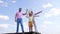 Happy family of boy kid with dad and grandad hold paper planes pointing fingers sky-high, aiming