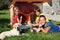 Happy family building a doghouse together