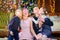 Happy family celebrates in a decorated room near the festive Christmas tree