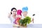 Happy family chef prepare vegetable meal on white