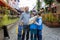 Happy family, children and adults, enjoying the colorful city of Stavangen in Southwest Norway in summer