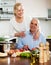 Happy family cooking soup