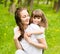 Happy family - daughter, and mother in park