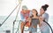 Happy family doing luxury sailboat trip - Father, mother and daughter having fun traveling in caribbean sea - Travel, love and