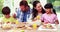 Happy family eating lunch together