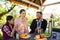 Happy family enjoy snack in park pavillion