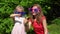 Happy family girls mother and daughter put on huge sun glasses