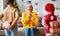 Happy family grandchildren gives a cheerful smiling grandmother a Christmas gift