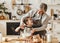 Happy family grandmother and granddaughter child cook in the kitchen, knead dough, bake cookies