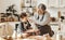 Happy family grandmother and granddaughter child cook in the kitchen, knead dough, bake cookies