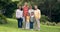 Happy family, grandparents and portrait outdoor at a park with love and care. Senior man and woman with young parents