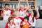 Happy family with grandparents watching basketball match