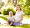 Happy family on green grass