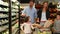 Happy family grocery shopping together