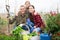 Happy family with harvest vegetable in garden