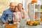 A happy family have a thanksgiving dinner and sends a video greeting to their parents