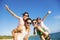 Happy Family Having Fun at the Beach