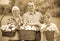 Happy family holding baskets with apples