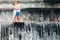 Happy family honeymoon holiday. Couple in cascade waterfall pool.