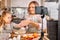 Happy family in the kitchen. food blogger mother and daughter preparing the dough