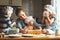 Happy family in kitchen. mother and children preparing dough, ba