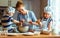 Happy family in kitchen. mother and children preparing dough, ba