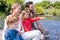 Happy family at a lake