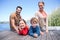 Happy family at a lake