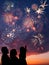 Happy family looks fireworks