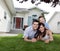 Happy Family Lying on Grass