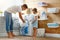 Happy family man father householder and child in laundry with