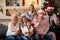 happy family moments â€“ family with sprinklers celebrating Christmas holidays.