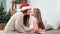 Happy family mother and cute daughter smiling playing touching nose celebrating Christmas holiday