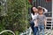 Happy family parental activity mother daughter hand in hand play and have fun outdoor in summer park child parent love girl