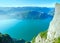 Happy family on Preikestolen massive cliff top (Norway)