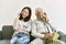 Happy family relationship, Asian elderly old father and smiling daughter make a phone call to each other.