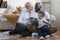 Happy family resting at home, a multicultural family