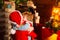 Happy family. Santa claus coming. Mother and little child boy adorable friendly family having fun. Family having fun at
