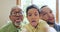 Happy family, selfie and tongue out with boy child, father and grandparent bonding in their home together. Emoji