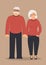 Happy family seniors: cute smiling holding hands smart elderly man and woman in full growth dressed in trendy clothes in dark and