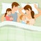 Happy family sleeping together in the bed