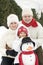 Happy family with snowman