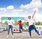 Happy family standing on the go kart race track