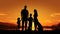 Happy family on sunset background, silhouettes of people and dogs, beagle and belgian shepherd malinois