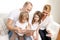 Happy family with tablet pc and credit card