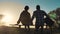 Happy family teamwork sitting on a bench silhouette sunset in the park and nature. Dad and daughter relax in the park