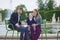 Happy family of three in Palais Royal in Paris